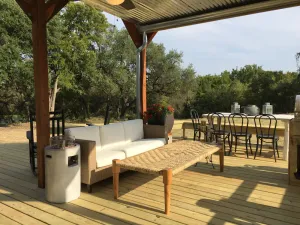 Image of HGTV’s “BARNDOMINIUM” 16 Acres w\/ Lake, Outdoor Kitchen, Decks & Playground