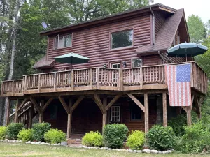 Image of Sidell's Sturgeon River Log Cabin - Bonfire Pit, WiFi, Biking Trails, Rafting