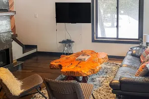 Image of Stylish & Modern Cabin near Creek & Town with Fireplace & Shared Grill Area