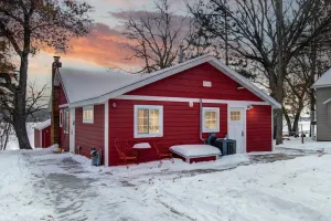 Image of Cozy red cabin on Briggs Lake Chain w\/ boat house