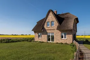 Image of Relax in the thatched house with sauna, fireplace, water view and XXL garden