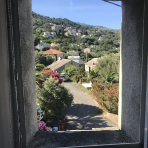 Image of Charmente small house between sea and mountain