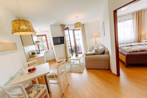Image of Modern, chic apartment with balcony and beautiful views, free Wi-Fi