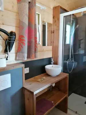 Image of Wooden bungalow in the countryside on a multi-family estate
