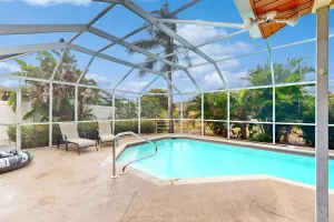 Image of Pristine Home | Screened Lanai with Pool & Alfresco Dining | Near Beach