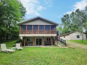 Image of Beautiful Lakefront Home On Large Wooded Lot.