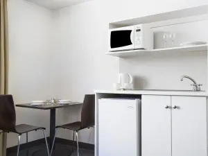 Image of ex hotel ensuite room with two beds