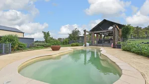 Image of Kelman Cottage with pool and beautiful native wildlife