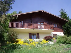 Image of Comfortable wooden chalet with terrace tourist village, mountain views
