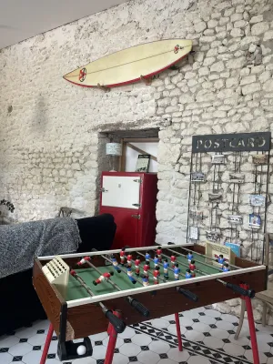 Image of Old restored wine storehouse between sea and forest