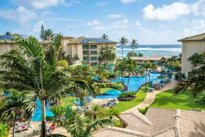 Image of Waipouli Beach Resort E406 - Pool\/Distant Ocean View, central A\/C, W\/D
