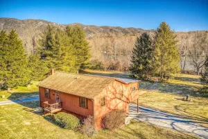 Image of Riverfront property - kayaks, hot tub, fire pit!