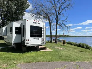 Image of Lakeside 5th Wheel on beautiful Nelson Lake