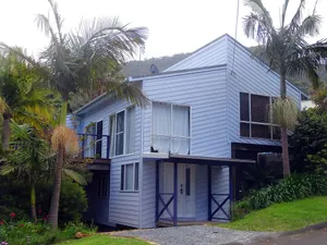 Image of Jacaranda House where beach meets rainforest