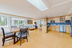 Image of Modern water view retreat with foosball table, expansive deck, and gas fireplace