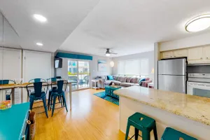 Image of Updated corner unit condo on ocean block with balcony, pools, W\/D, & central AC