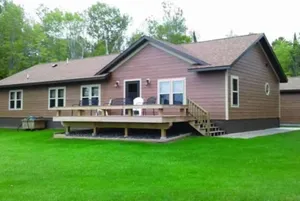 Image of River Rock Cottage Is Located On The Shore Of Lake Superior On Chequamegon Bay.