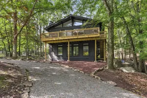 Image of Hopskip Luxury Chalet • Firepits • Gas Grill • Lawn Games • Pool • Lake