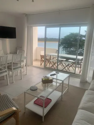 Image of Waterfront apartment in wooded park