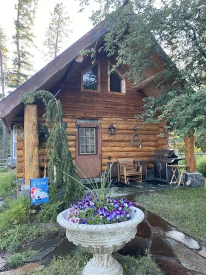 Image of Quaint Log Cabin with River View. 7 miles to the entrance of West Glacier