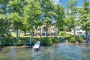 Image of Modern Lake Opechee Home features Sandy Perched Beach and Dock