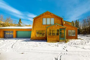 Image of Rustic home with mountain views, wood-burning stove, basketball court, & patio
