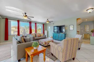 Image of Canal-front, family-friendly home w\/ soaking tub, dock access & water view