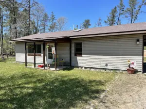 Image of Copper Fox Cottage is cozy and welcoming, near trails and Manistee River.