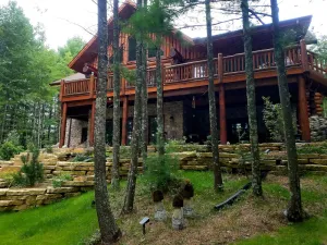 Image of Executive Log Home on Beautiful Lower Post Lake All Seasons