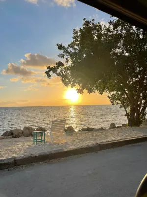 Image of Waterfront - Private Lagoon - in Park on the Ocean side -beach, pool