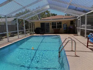 Image of This is a nice house with a swimming pool.