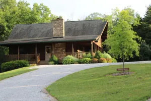 Image of Secluded Log Cabin getaway, with hot tub, and a beautiful view.