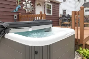 Image of MTM Premier, YEAR-ROUND Hot Tub, fence