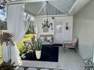 Image of Modern studio apartment with covered outside seating area