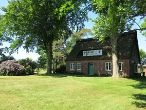 Image of Idyllic thatched cottage in a unique natural setting