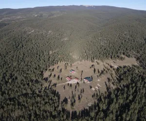Image of Mountain log cabin, horse barn\/fenced paddocks.Hunting, hiking,horseback riding