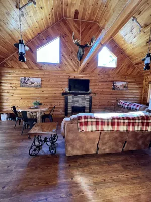 Image of Beautiful cabin with fireplace and wrap around porch and private upstair balcony