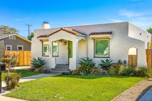 Image of Sunny coastal bungalow with updated interior, fenced yard, & washer\/dryer