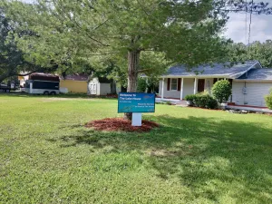 Image of The Lake House at Turtle Cove: Cozy relaxing lake home with dock on wooded lot.