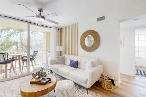 Image of Beautiful bright condo with a balcony & W\/D - pool, gym, and game room access