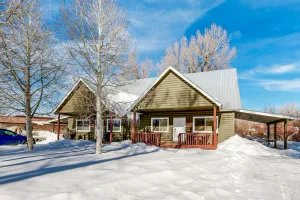 Image of Lovely home with patio & yard - great central locale near fishing & skiing