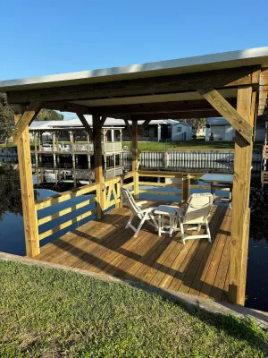 Image of The Bass House water front canal with dock and WiFi.