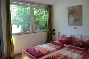 Image of Modern bungalow with fireplace in a green setting from 65 Euro per day