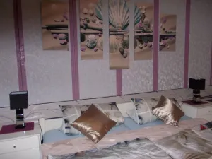 Image of North Sea vacation in large vacation apartment balcony beach chair garden barbecue