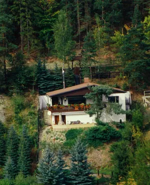 Image of On the edge of the forest with a beautiful panoramic view of 2 valleys