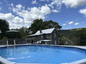 Image of The Blue Heron · Walk to the Falls! Celebrate Summer! Pool, Hot Tub & Fire Pit!