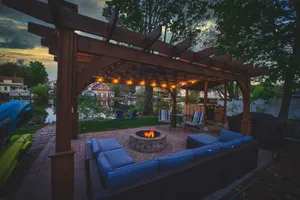 Image of Waterfront with Kayaks, Pool Table, Fire Pit, and Pergola. Downtown area