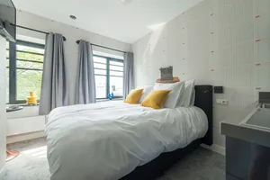 Image of Unique apartment with private kitchen and bathroom, inspired by the abstract art of Lena Milius.