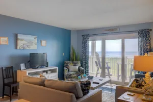 Image of Beachfront condo with private beach access, balcony, on-site pool, tennis & AC