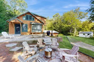 Image of Belgrade Lakes getaway with private swim dock, outdoor living, & canoe\/kayaks